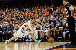 Our beat writers expect Syracuse to fall by double-digits against the Blue Devils.
